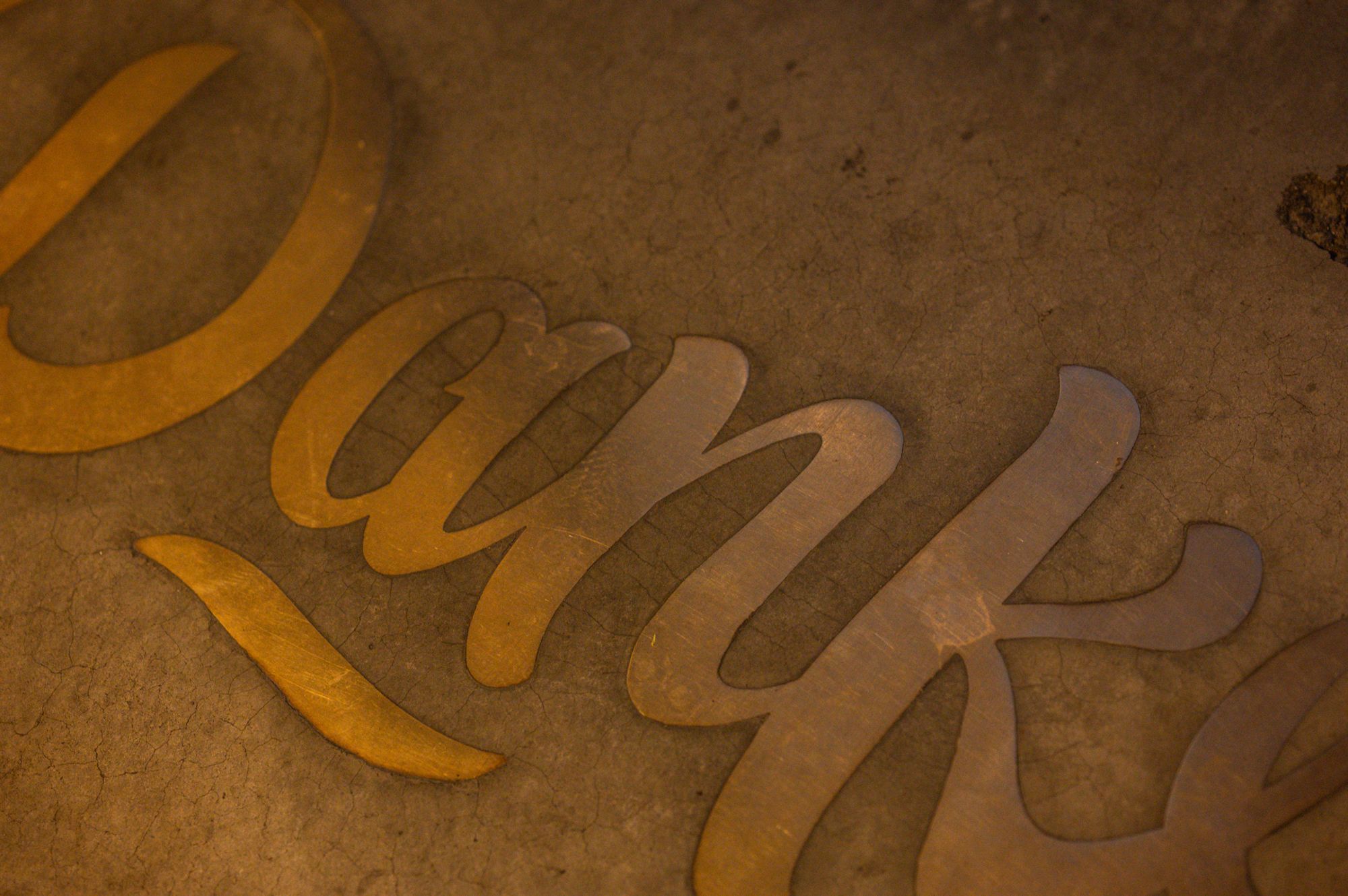 brass inlay typography