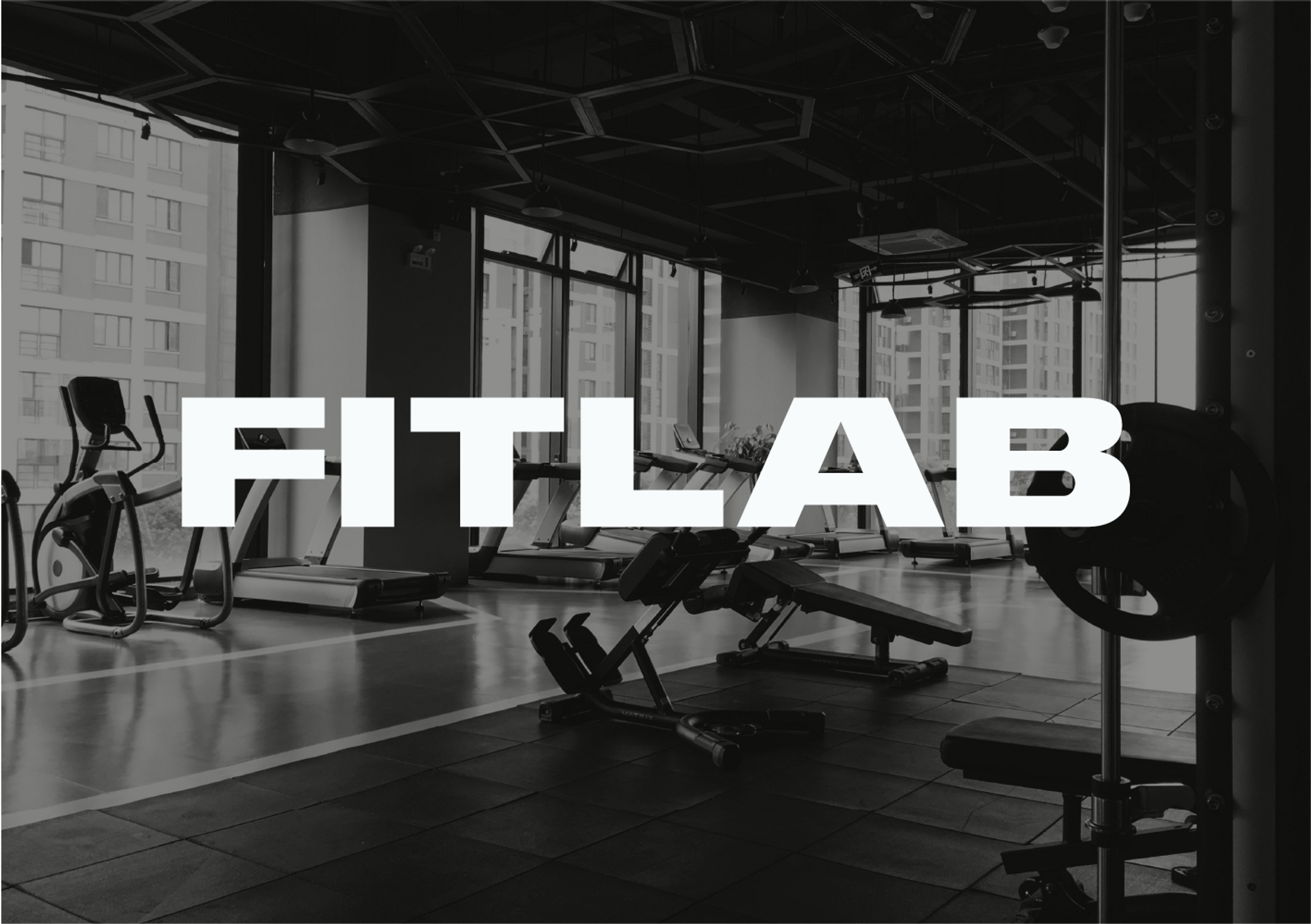 Fitlab logo over gym image