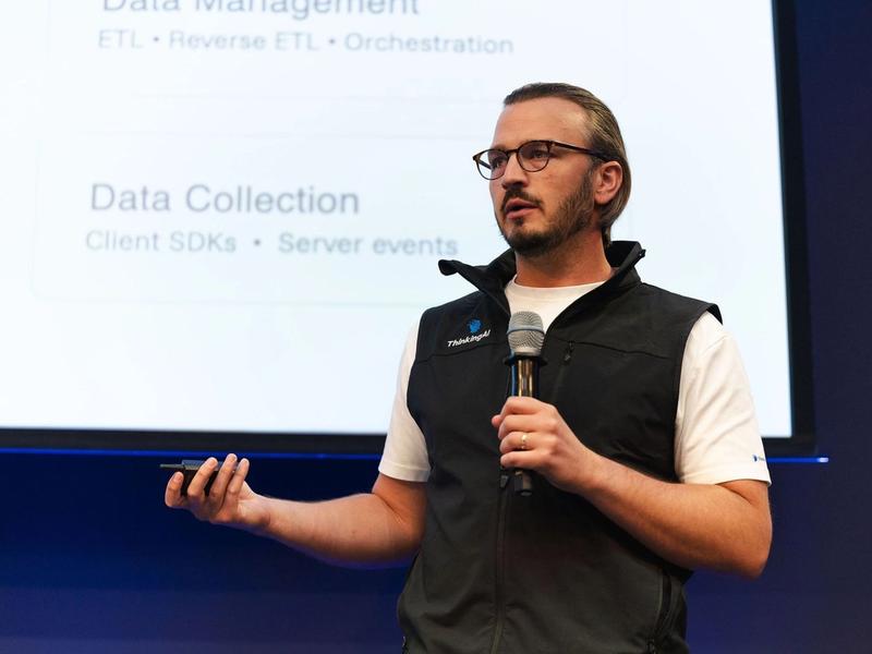 Daniel Usedom speaking on stage