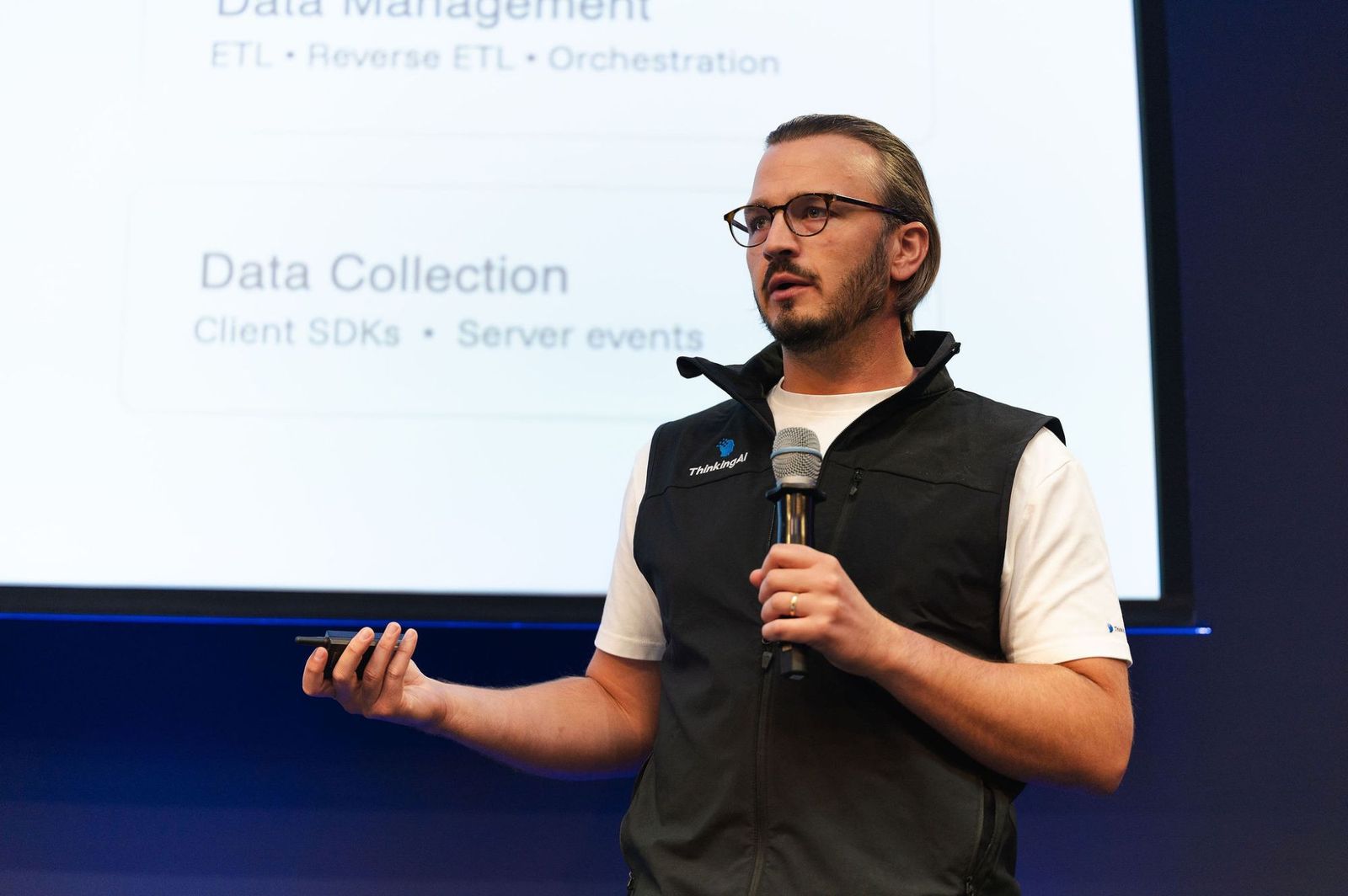 Daniel Usedom speaking on stage