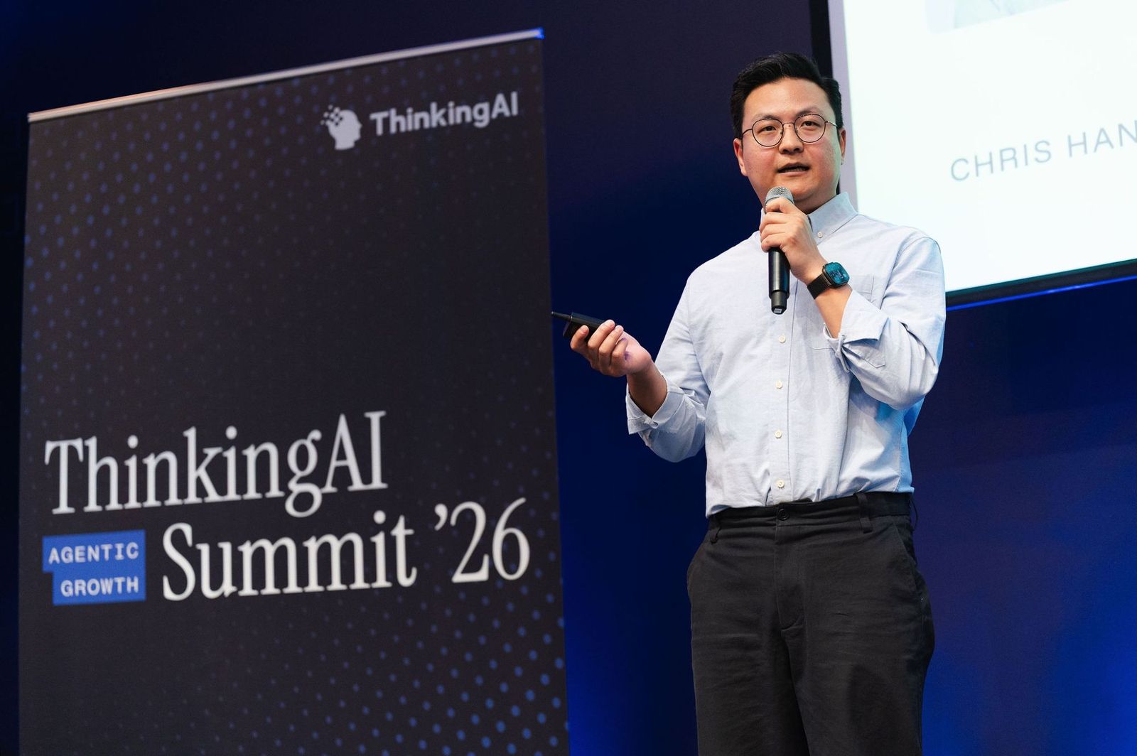Chris Han on stage opening the ThinkingAI Agentic Growth Summit