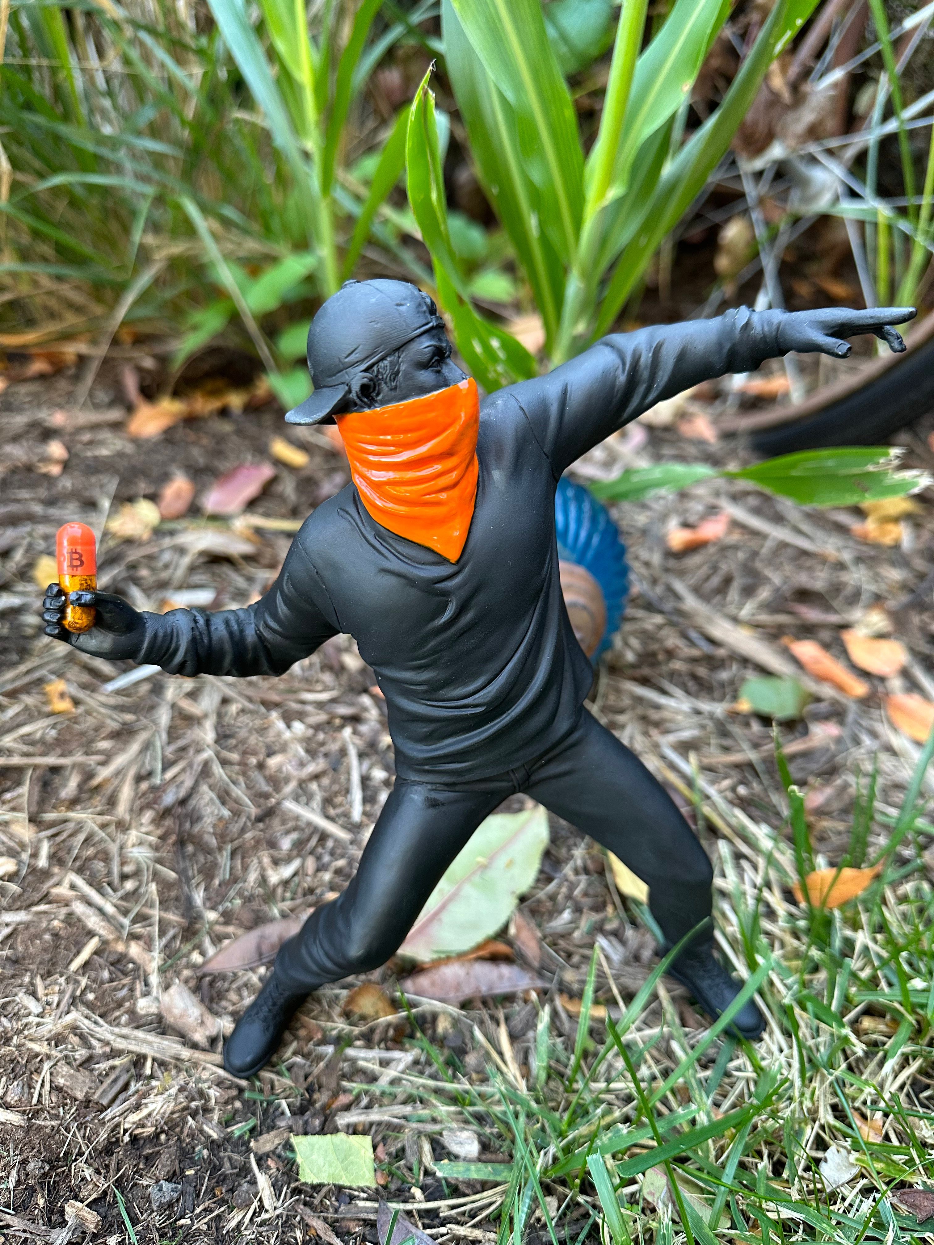 banksy inspired pill thrower