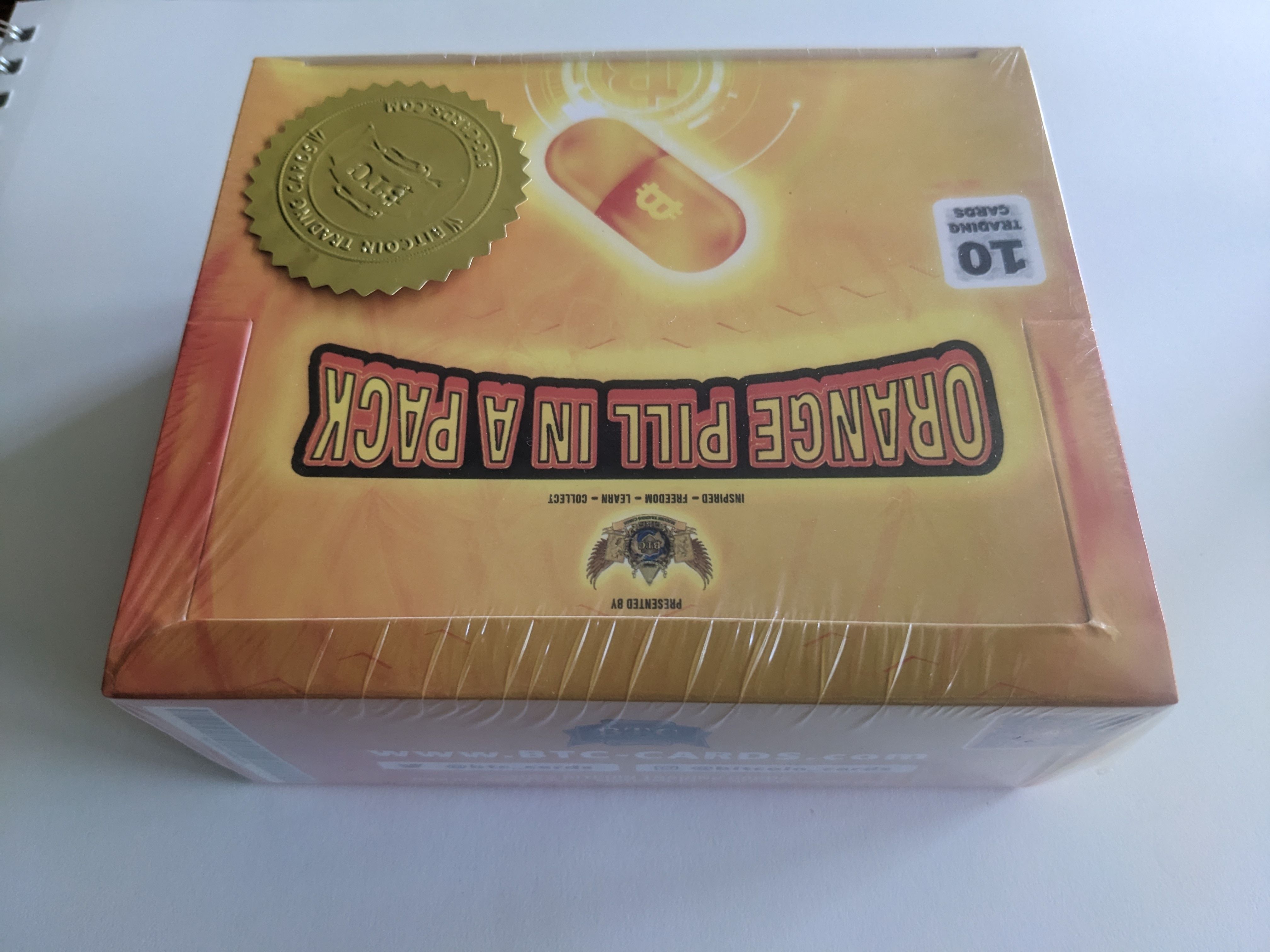 S1 “Orange Pill in a Pack” Box (24 packs) - Auction #3 | Scarce City