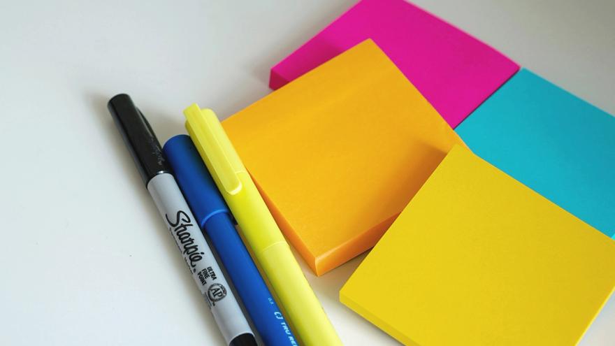Sticky notes and pens