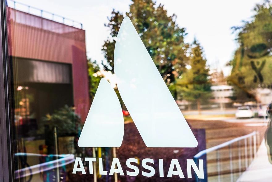 Jira tutorial: Atlassian logo and their office at the background