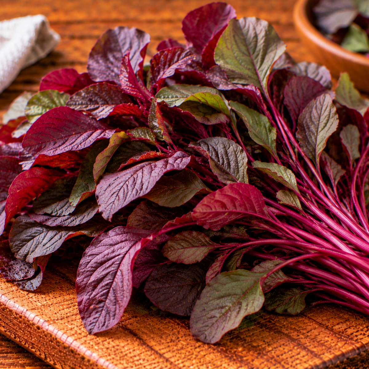 Red amaranth leaves with green foliage and red-toned stems