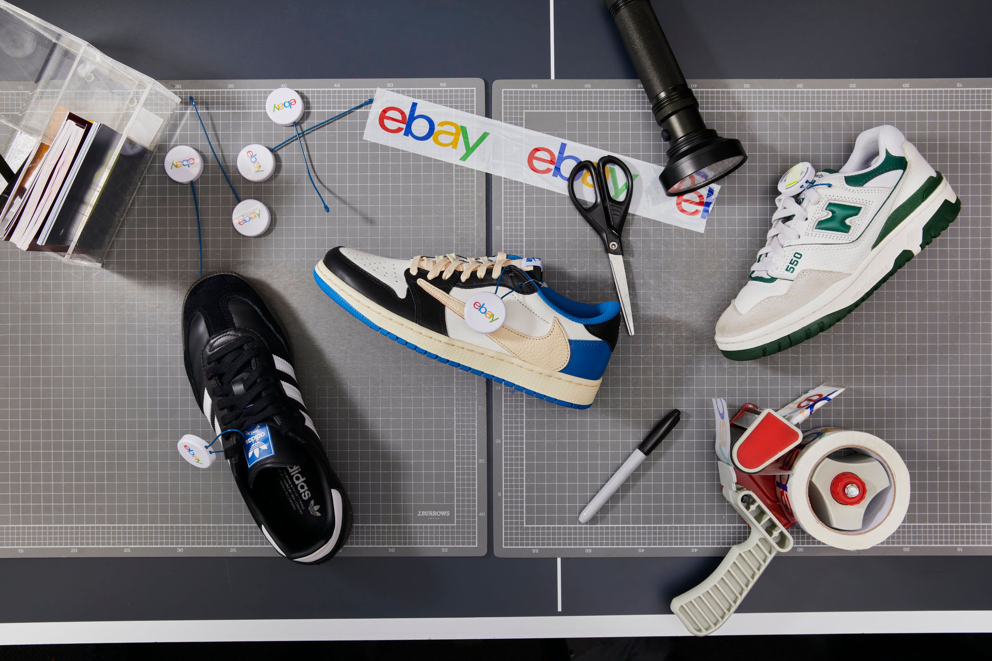 Three sneakers with eBay authenticity tags and authentication tools on a grey mat.