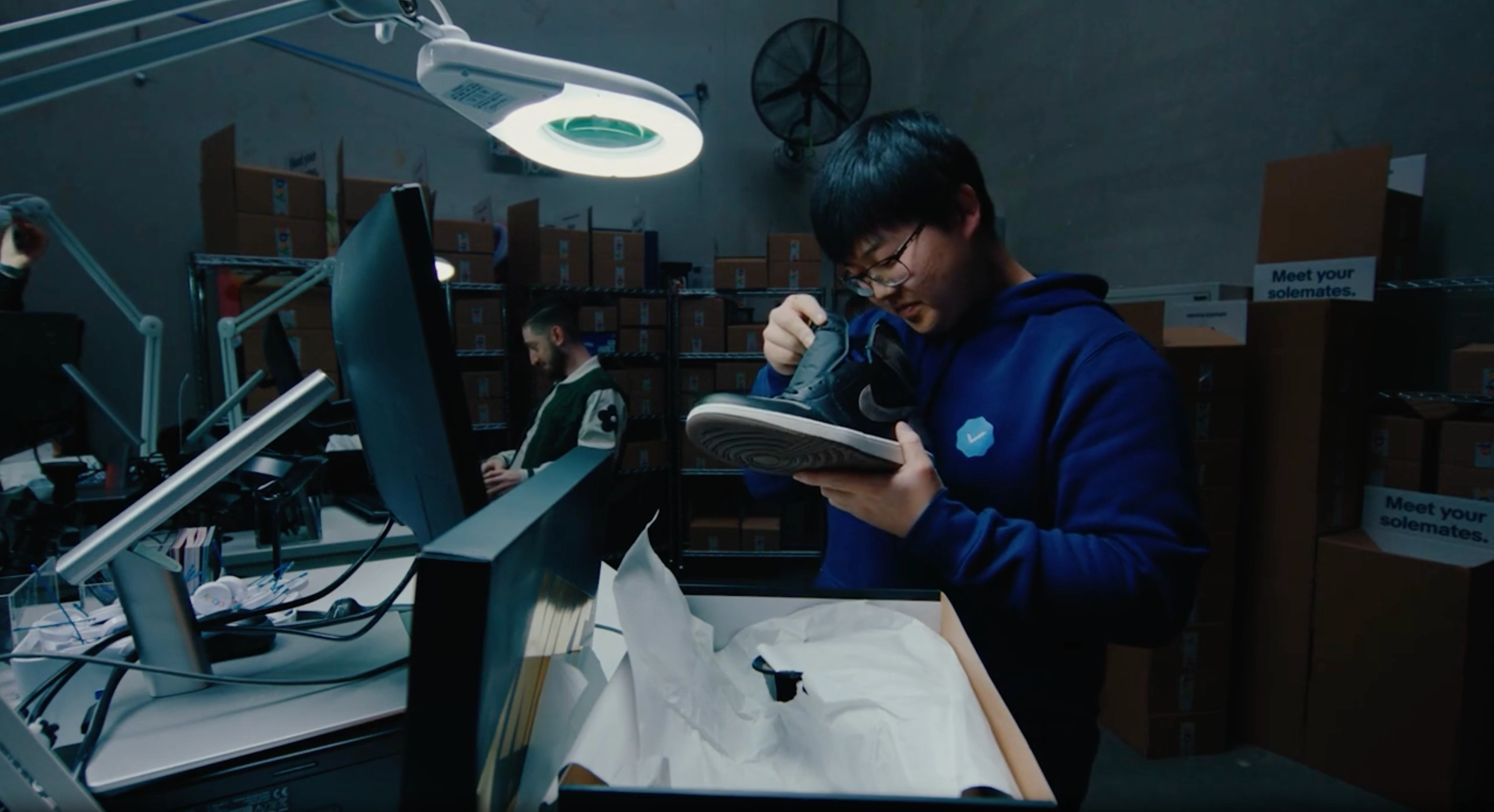 Man inspecting shoe