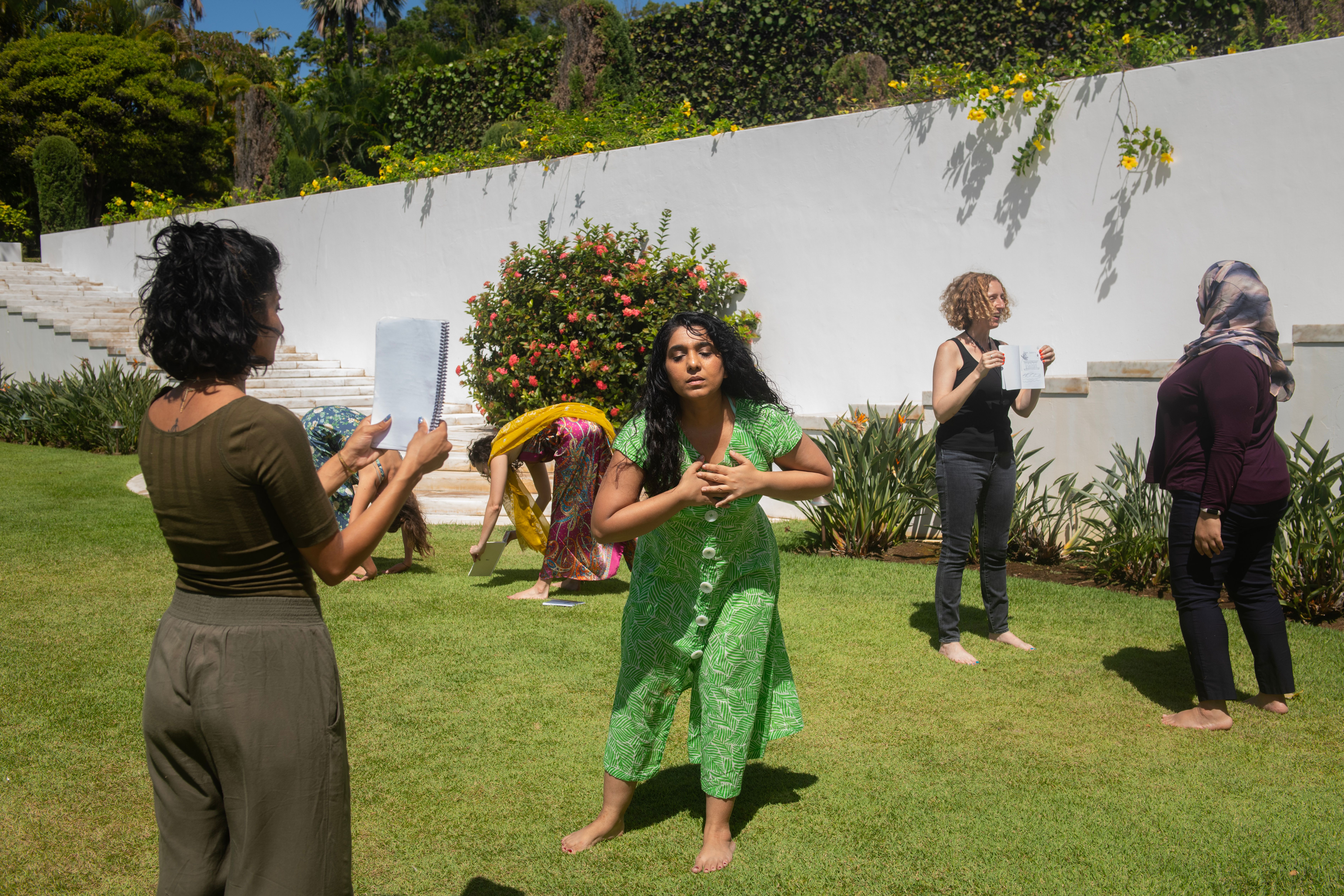 A group of artists outdoor during a retreat exercise