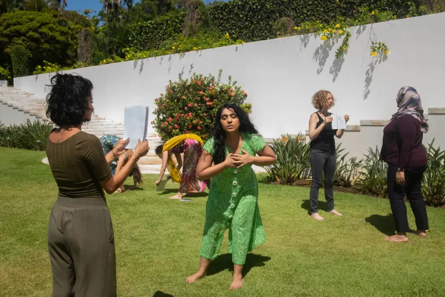 A group of artists outdoor during a retreat exercise
