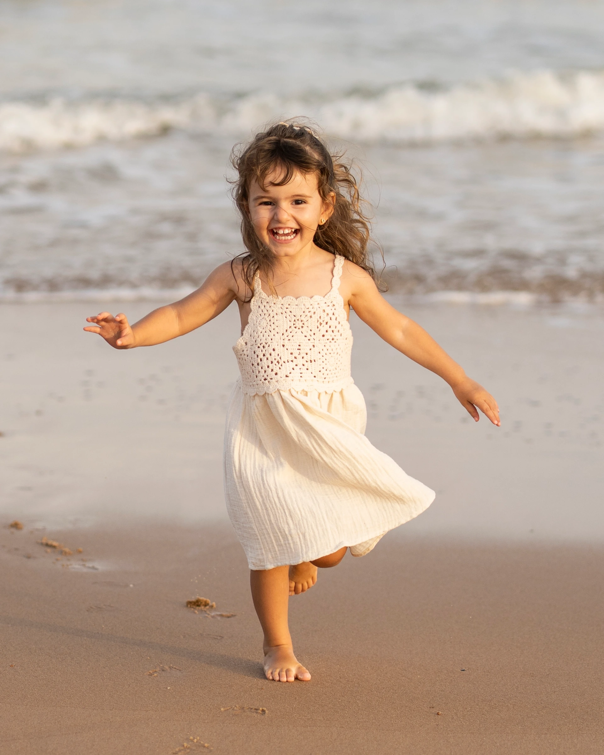 A close portrait of a young child in soft natural light