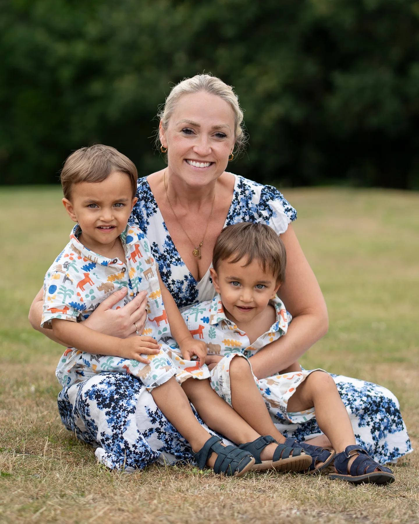Mummy with your little boys playing outside in the park