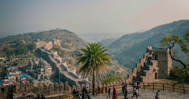 Kumbhalgarh Fort's 36-kilometre wall snaking across the Aravalli Hills — the third-longest continuous wall in the world, 7 metres wide at its base; foreigners ₹600, the fort was successfully breached only once in 300 years and only by poisoning the water supply