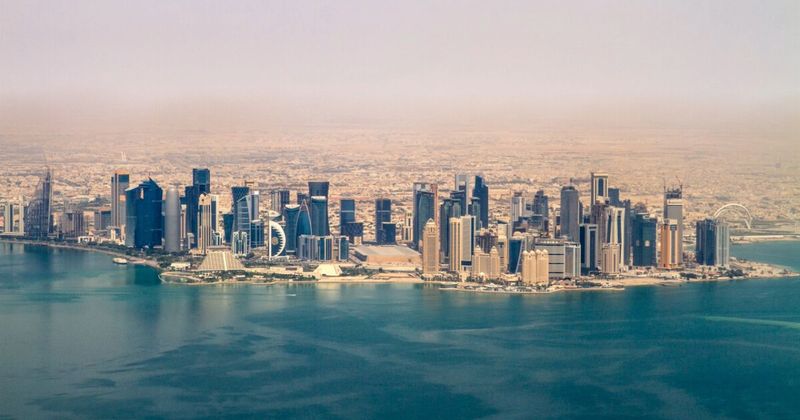 Doha skyline West Bay — Discover Qatar stopover programme layover India flights 2026