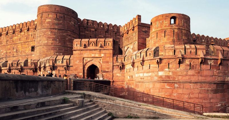 Agra Fort in Agra — the UNESCO World Heritage red sandstone Mughal fortress contains the tower from which imprisoned Emperor Shah Jahan was said to gaze at the Taj Mahal he built for his wife; foreigner entry ₹650