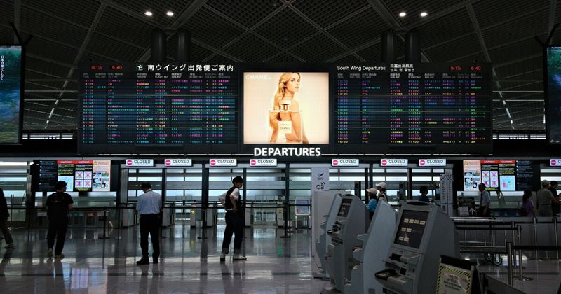 Airport departure terminal — Japan to India flight booking 2026 Tokyo Narita Osaka Kansai.