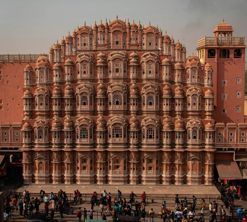 Hawa Mahal — the five-storey pink sandstone Palace of Winds in Jaipur — entry ₹200 for foreigners and best photographed from the café rooftop directly across the road