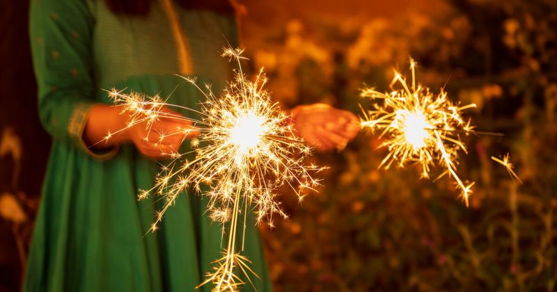 Diwali sparklers in India — the Festival of Lights involves fireworks from dusk to well past midnight for several days; air quality in North Indian cities spikes significantly around Diwali; earplugs recommended for light sleepers; Diwali 2026 is October 20