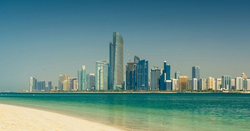 Abu Dhabi UAE corniche waterfront — Etihad stopover hotel free program Hyderabad to USA via Abu Dhabi 2026.