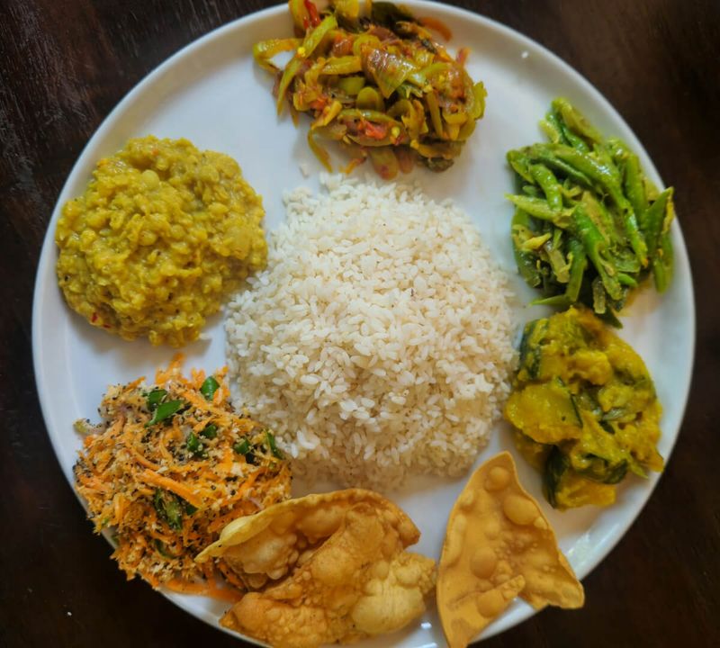 Sri Lanka local rice and curry meal — international trip under ₹20000 from South India Chennai budget food cost 2026.