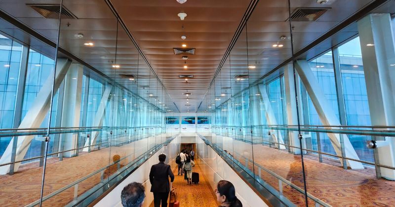 JFK airport international terminal departure gates — cheap flights New York to India 2026