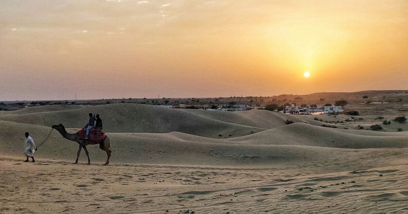 Sam Sand Dunes, Jaisalmer — overnight desert camp ₹2,500–4,750/person; camel ride, folk music, Milky Way at 10pm.