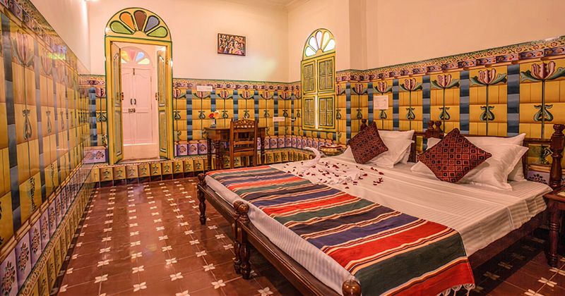 Chettinad heritage mansion — Burmese teak columns, Belgian crystal, Italian marble; 60–70% of great mansions will be demolished within 20 years.