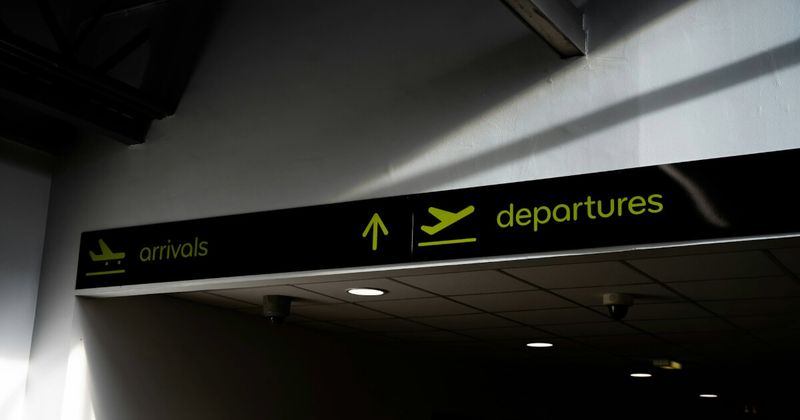 UK airport terminal departure hall — cheapest city pair UK to India flights 2026 London Mumbai Delhi