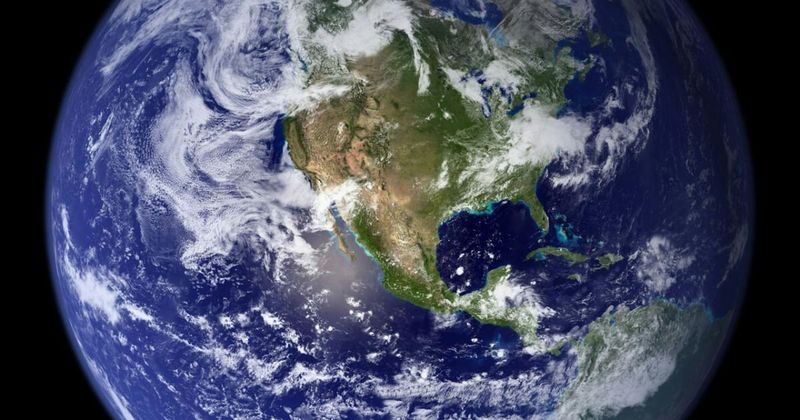 Earth from space showing globe — great circle polar routing USA to India fastest nonstop 2026.