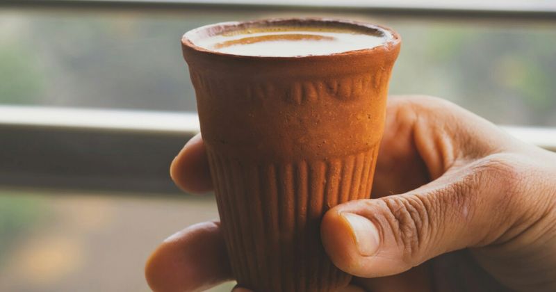 Masala chai served in traditional clay cup India