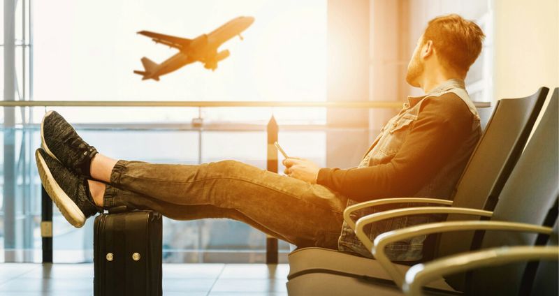 Los Angeles LAX airport terminal aircraft — monthly price breakdown cheap flights to India 2026