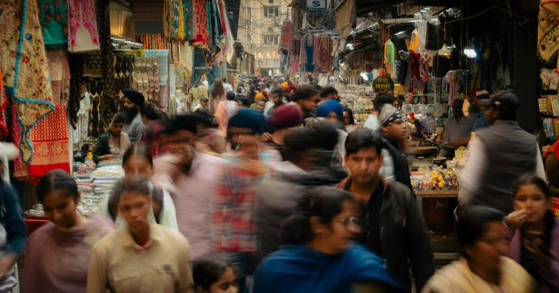 Heritage Street in Amritsar — the 1-kilometre promenade connecting the Golden Temple's main entrance to the historic Town Hall; the bazaar running along it sells textiles, religious items, dried fruits, and the city's famous pappads and phulkaris; the Partition Museum at the far end is in the Town Hall building