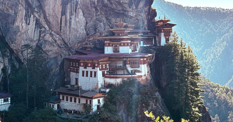  Bhutan Paro Taktsang Tiger's Nest Monastery — reachable from India on return flights from ₹12,000 with no visa but ₹1,200 per night SDF applies