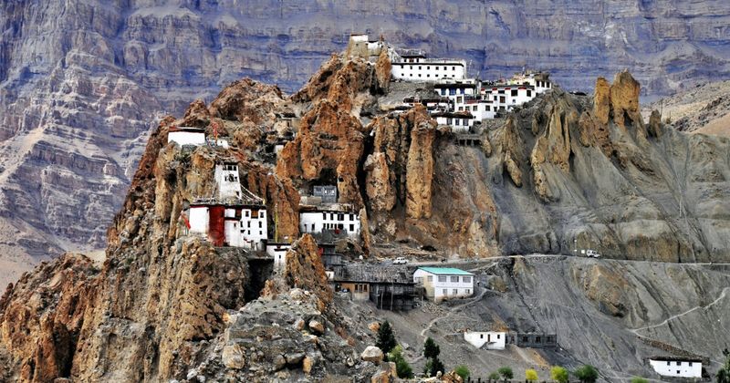 Dhankar Monastery on its eroding clay pinnacle above the Spiti Valley — free entry; the ancient capital of Spiti before Kaza; 3,890m altitude.