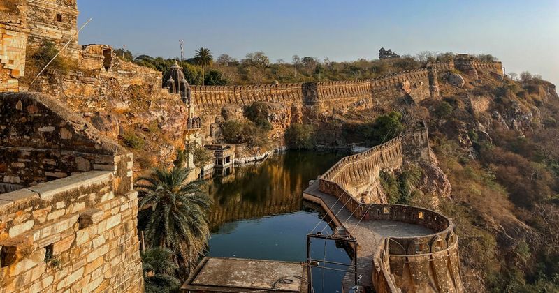 Rajasthan's landscape — the Rajput fort architecture of North India's desert state, built from local ochre and red sandstone, sits in one of the world's most visually dramatic environments; the Rajasthan circuit connects five cities across this single landscape without backtracking