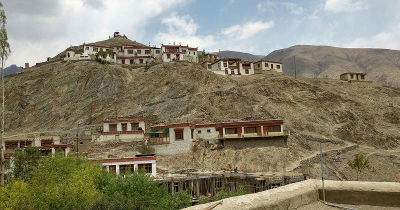 Lamayuru Monastery perched above the 'moonland' eroded clay formations in Sham Valley, Ladakh — believed to be Ladakh's oldest monastery dating from the 10th century; entry free, 125 kilometres west of Leh on the Leh-Srinagar highway
