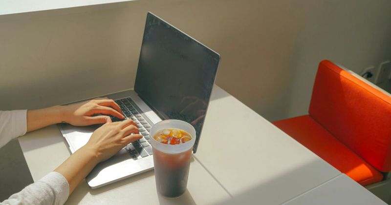 Applying for visa on laptop.