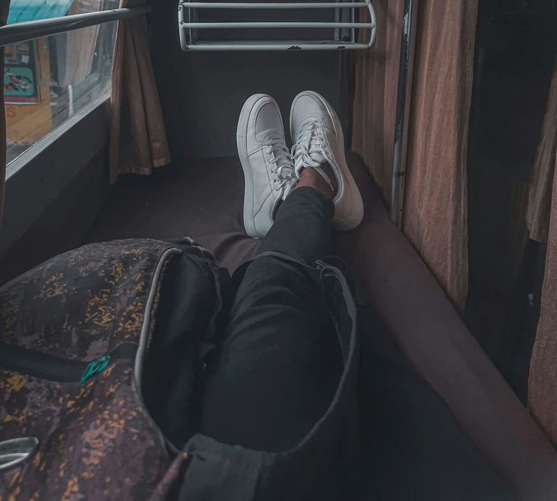  Interior of a AC sleeper bus at night — the Mumbai to Goa overnight bus covers the journey in 12–15 hours with premium options starting from ₹1,200 per berth