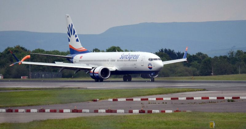 Manchester airport aircraft on tarmac — IndiGo nonstop MAN to Delhi India 2026