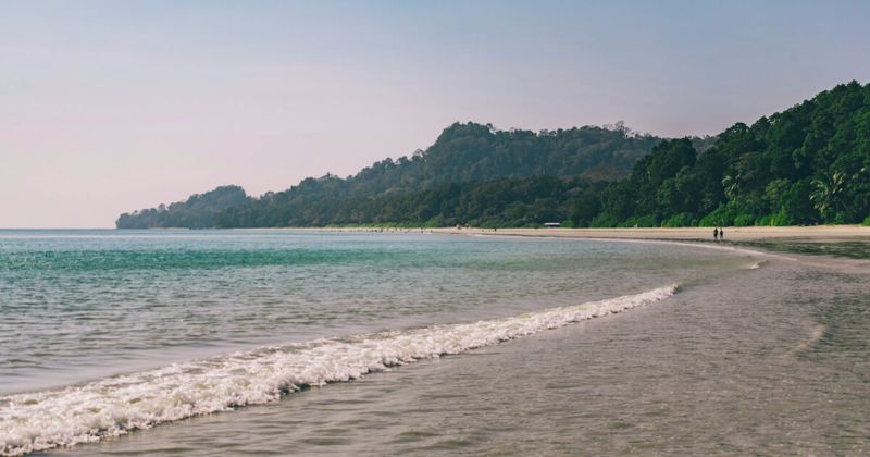 Radhanagar Beach (Beach 7) on Havelock Island (Swaraj Dweep) in the Andaman Islands — voted Asia's Best Beach by Time magazine in 2004; 7 kilometres of white sand backed by tropical rainforest; free entry; closed after sunset for sea turtle nesting protection