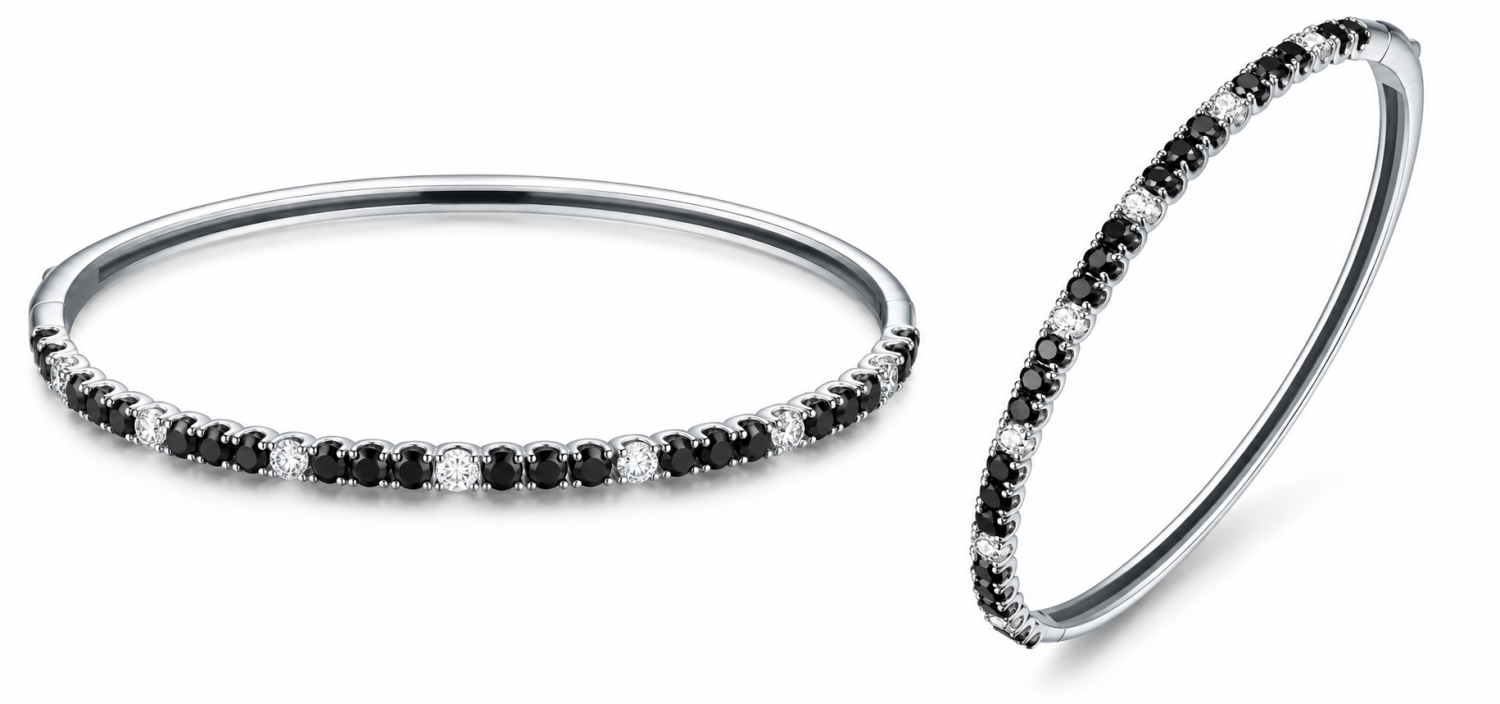 Black and white diamond half bangle in 18k white gold, shown from two angles