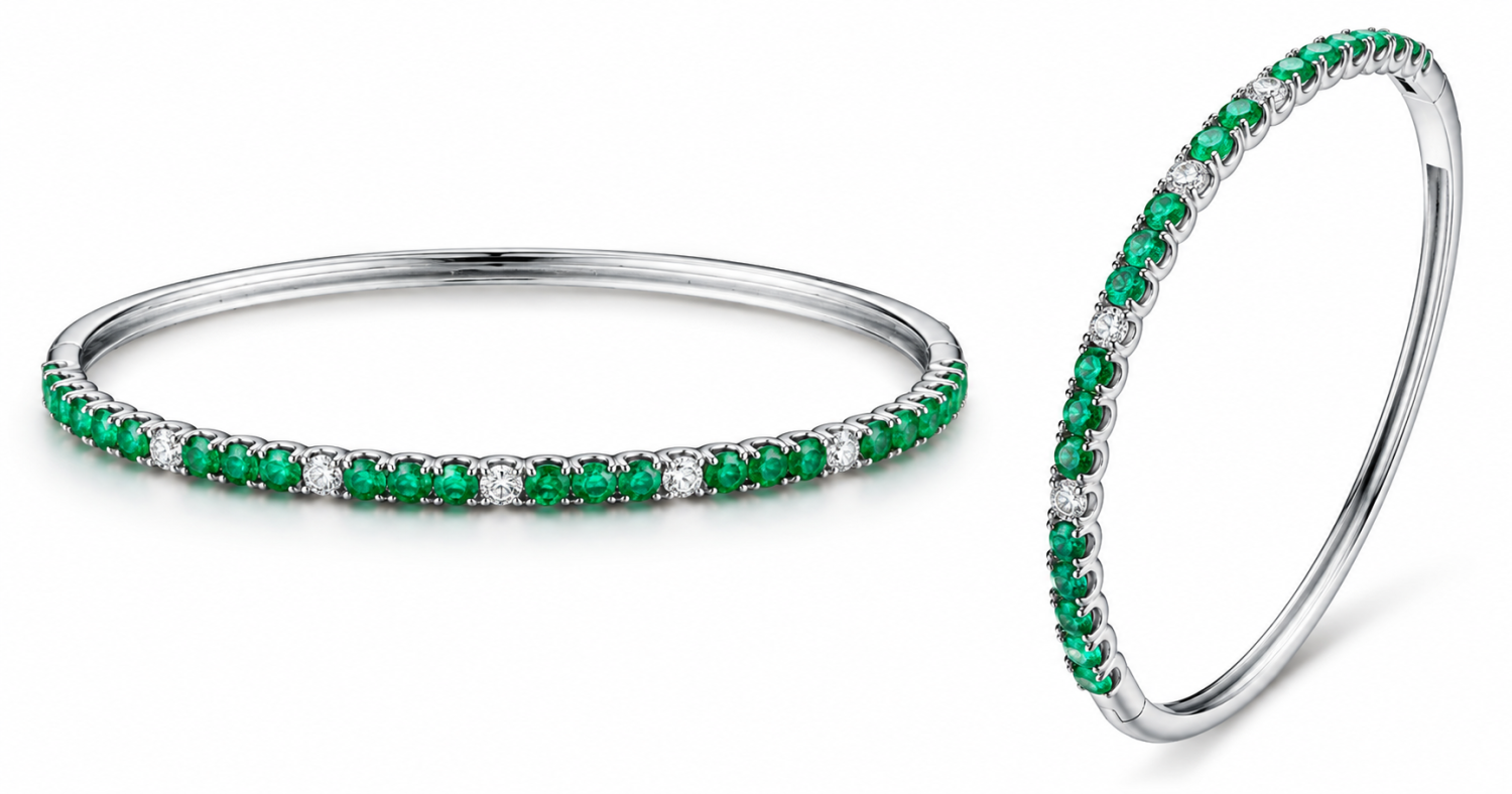 Round emerald and natural diamond half bangle in 18k white gold, shown from the front and side