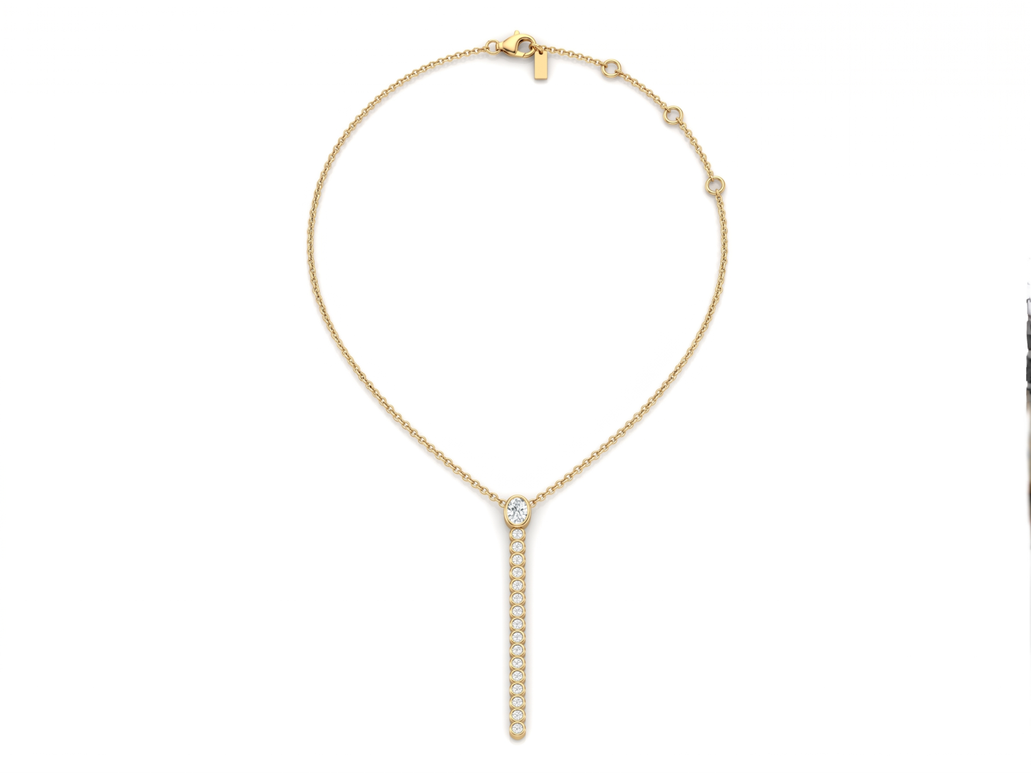 Yellow gold chain necklace with a single diamond at the top of a long vertical drop of round diamonds