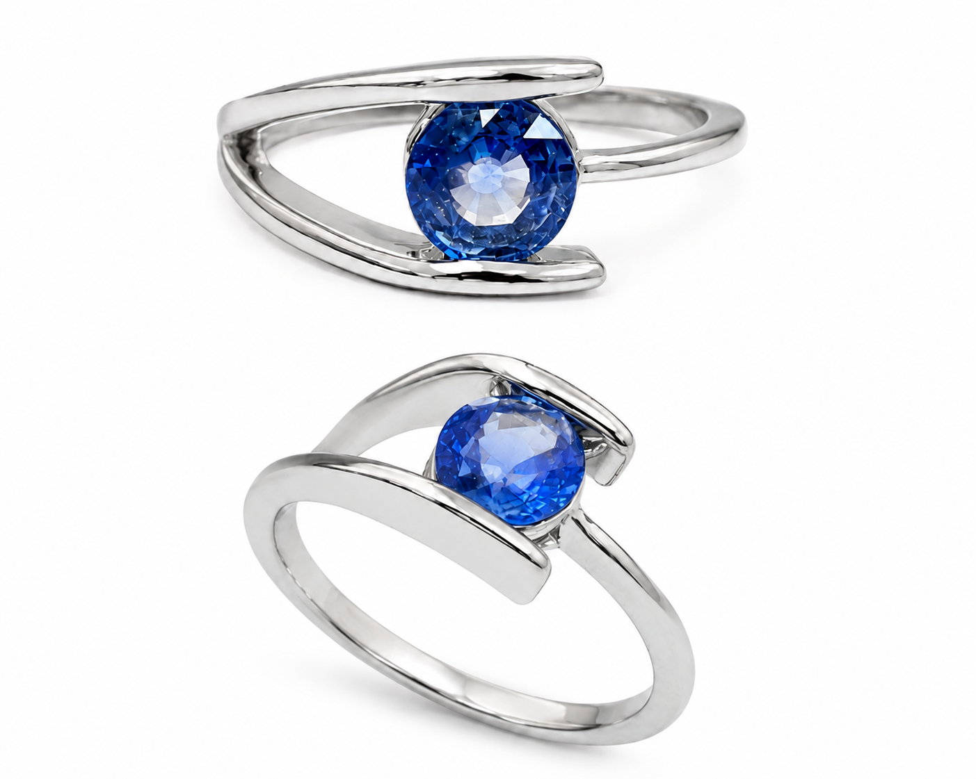 Round blue sapphire held in a sculptural open bypass ring in polished 18k gold