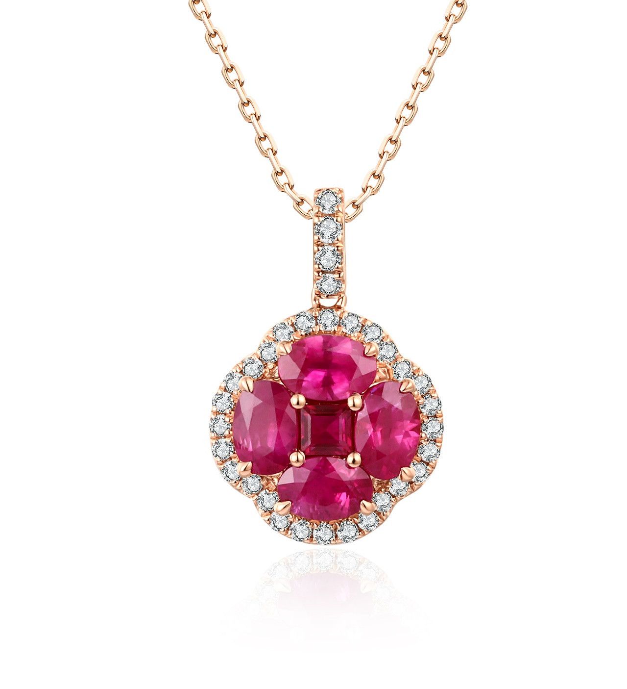 Ruby clover cluster pendant with a natural diamond halo and diamond-set bail in rose gold, shown on a chain