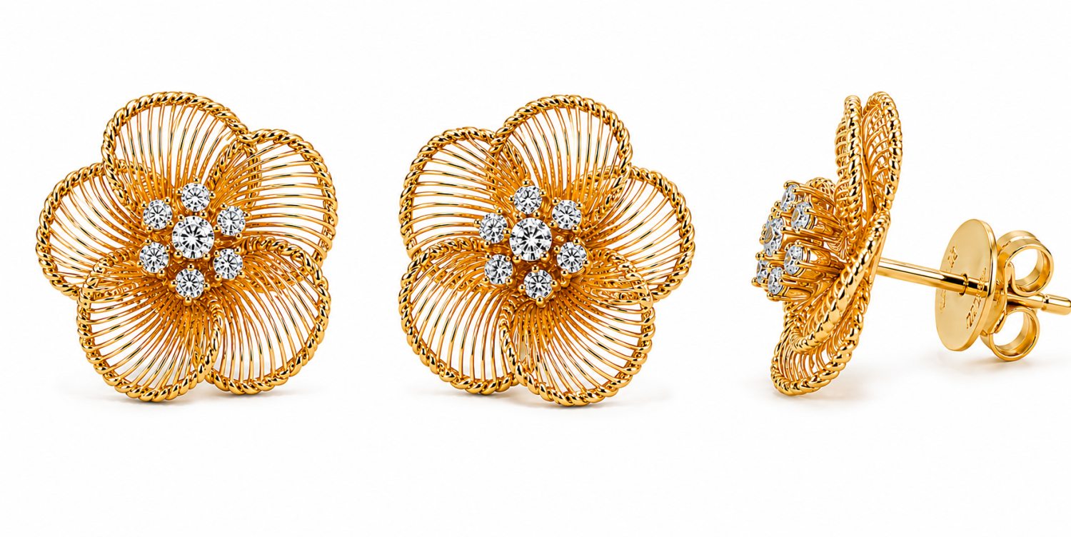 Front and side views of yellow-toned open wire flower stud earrings with round diamond clusters at the centres