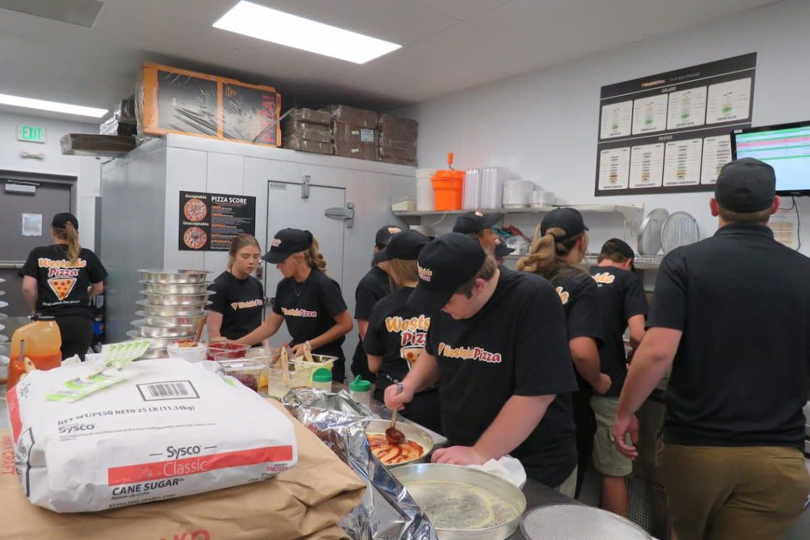 A westside pizza crew working during a shift
