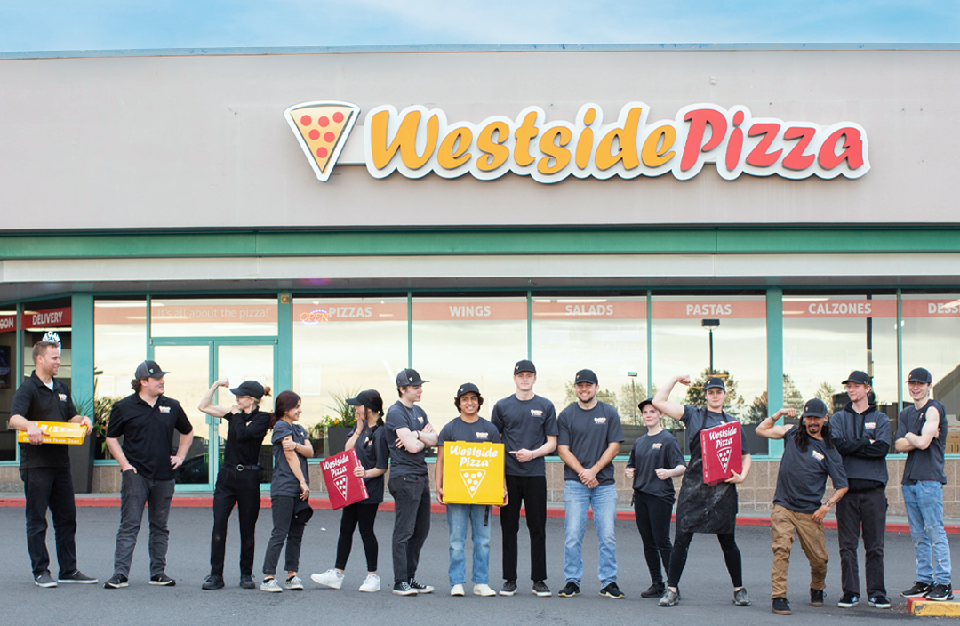 Employees with Pizza boxes outside of Westside Pizza in Blaine, Washington | Westside Pizza