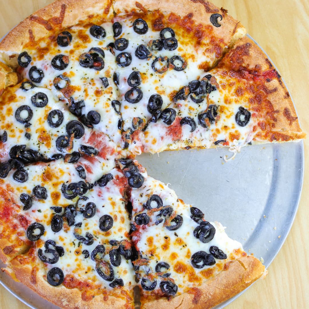 Close-Up of Cheese Pizza with Olives | Westside Pizza