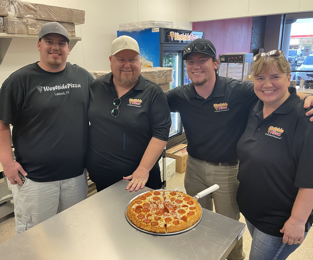 Owners inside Westside Pizza in Lubbock, Texas